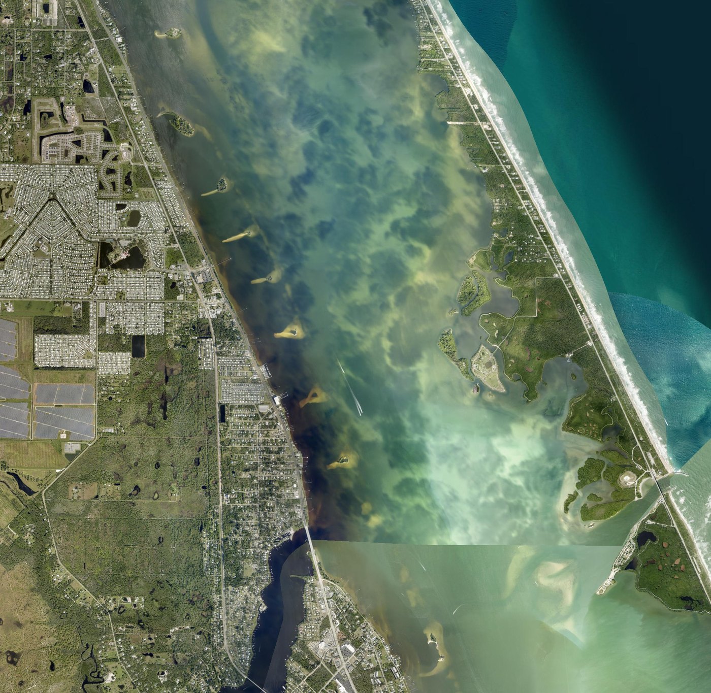Satellite map of the Indian River Lagoon showing the 5.4-mile boat route from Sunrise on the River's private dock at 6910 US-1 in Grant-Valkaria, down the Intracoastal Waterway past Micco and Long Point Park, to the Sebastian Inlet sandbar near Coconut Point